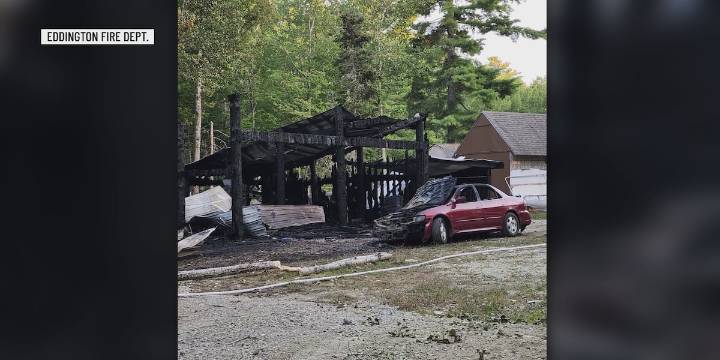 Garage fire in Eddington spreads to nearby woods