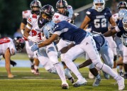 Mona Shores, Grand Blanc clash in 2025 high school football opener: See photos
