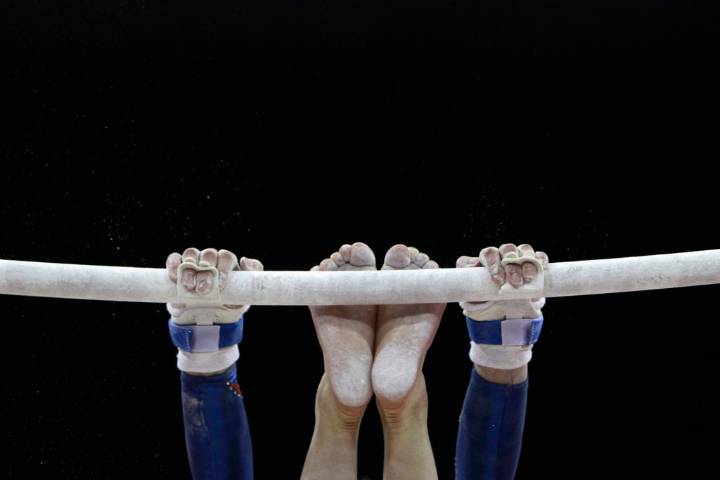 Ex-coach at renowned gymnastics academy arrested by FBI years after abuse reports