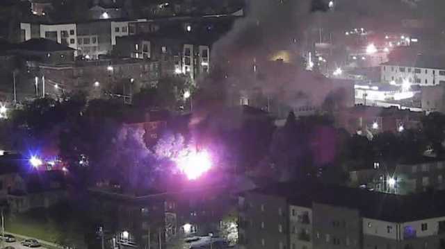Watch: Heavy smoke fills the sky as flames burn Omaha garage