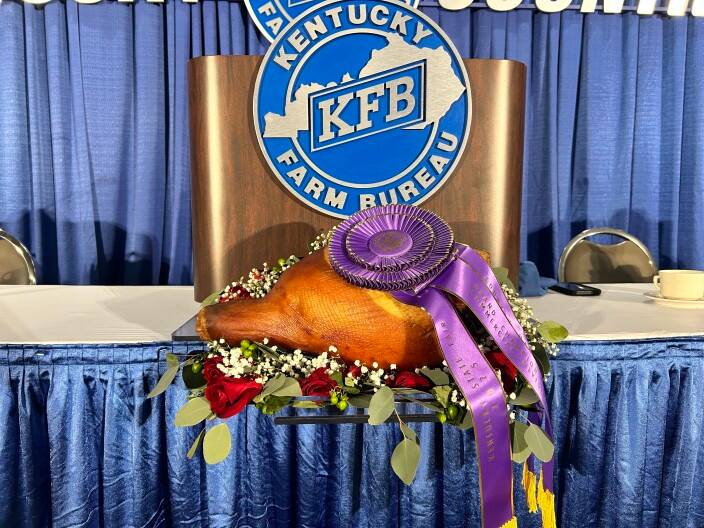 Kentucky politicians gather as championship ham auctions for millions at Farm Bureau breakfast