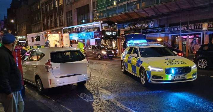 Edinburgh police lock down main street as 'cyclist struck by car'