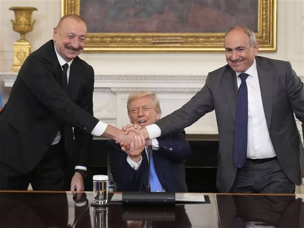 Leaders of Armenia and Azerbaijan shake hands and sign deal at White House peace summit