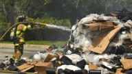 Waste Management driver forced to unload garbage that burst into flames