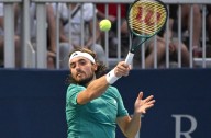Tennis-Tsitsipas upset by underarm serves as he slumps out of US Open