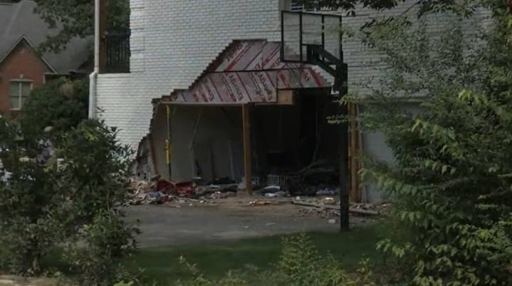 1 transported to hospital after car crashes into house on Brook Highland Drive