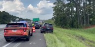 Vehicle stuck in ditch off I-16 at Chatham Parkway