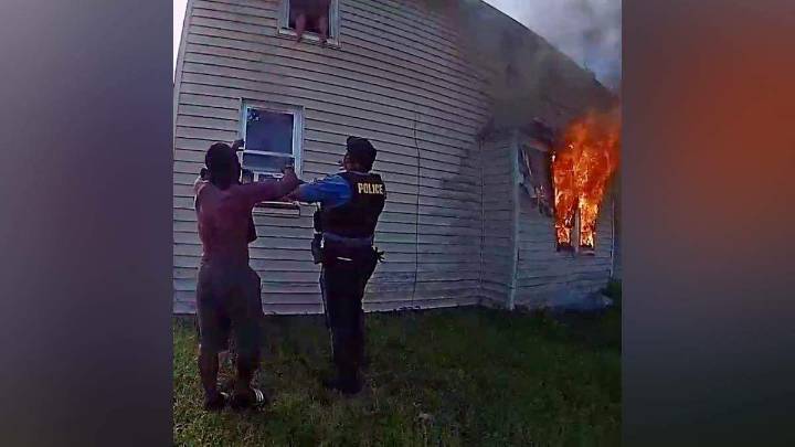 Police Officer Saves Boy Who Jumped Out Second Floor Window Of Burning Home