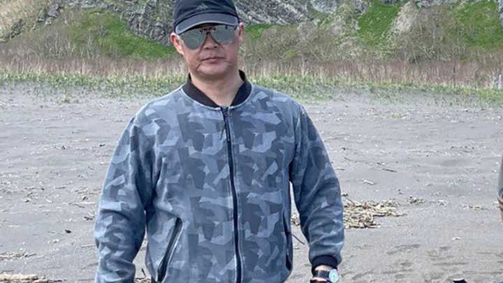 Pilot suffers fatal heart attack while flying tourists over erupting volcano... but wrestled down helicopter as he died