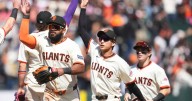 Giants' Jung Hoo Lee makes catch off glove, thigh and calf before pinning baseball between knees