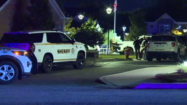 Neighbors shaken up after shooting that injured two deputies in Walton