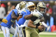 Chargers' defense shines in 27-13 win over Saints with pick