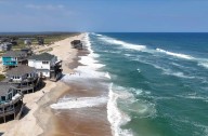 Summer celebrations meet closed beaches and warnings on US East Coast due to Hurricane Erin