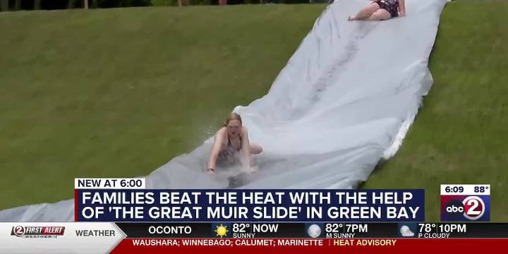 Families beat the heat with the return of the Great Muir Slide to Green Bay