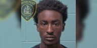 POLICE: Man arrested after shooting at car with person inside multiple times