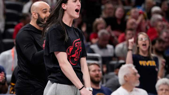 Snacks, laughs and cheers: See how Caitlin Clark has kept busy on bench while out with injury