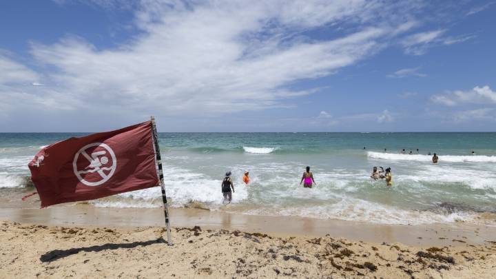 Hurricane Erin becomes a Category 4 in the Caribbean as the region braces for flooding