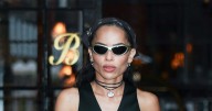 Zoë Kravitz Flashes Her Abs in Plunging Waistcoat & Slouchy Office Pants