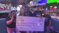 Miami nonprofit receives a donation to help adults with developmental disabilities enjoy recreational activities