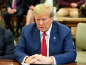 New York appeals court tosses $515m civil fraud penalty against Trump