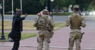 Trump's armed patrols unnerve parents with school reopening