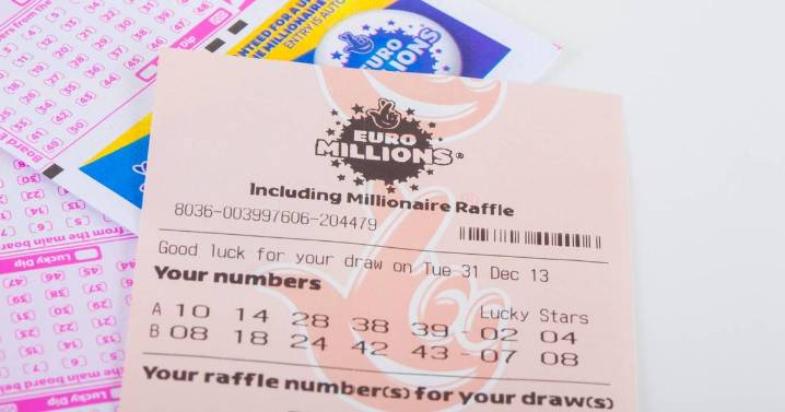 Supermarket change for people buying National Lottery tickets