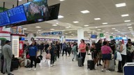 Inundaciones en AICM retrasan vuelos y benefician comercios