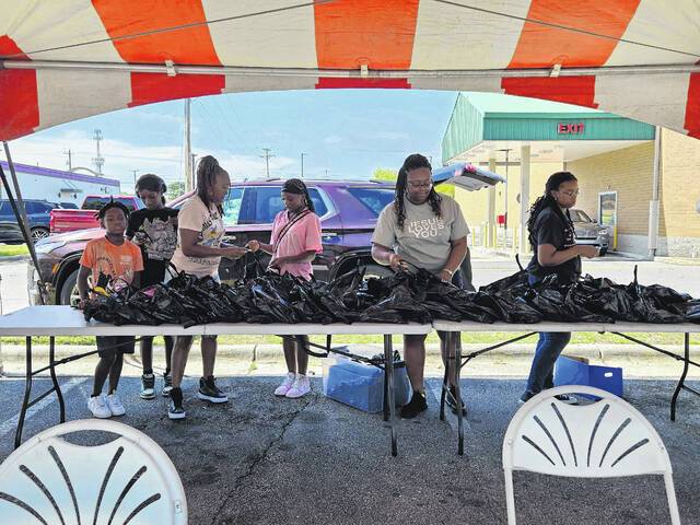 Local family business hosts school supply giveaway