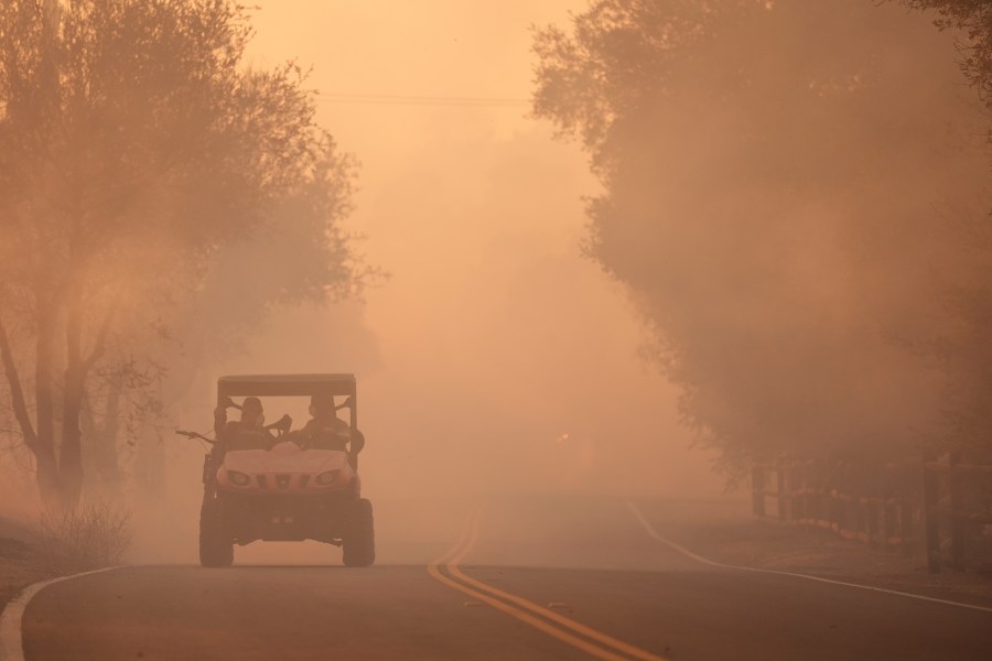 Firefighters make progress against blaze that forced thousands to flee north of Los Angeles