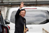 Former Thai Prime Minister Thaksin Shinawatra says he has been acquitted of royal defamation