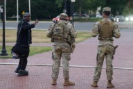 Schools reopen in Washington with parents on edge over Trump’s armed patrols