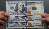 A cuánto cotizan el dólar oficial y el blue este viernes