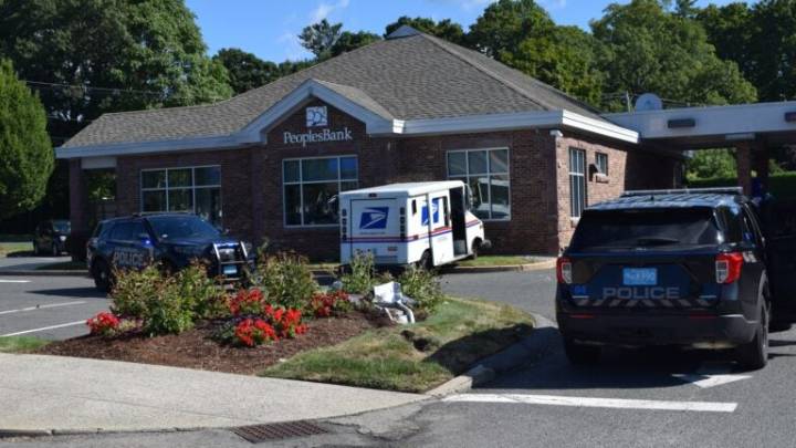 Mail truck driver faces OUI charges following alleged collision with pedestrian, bank