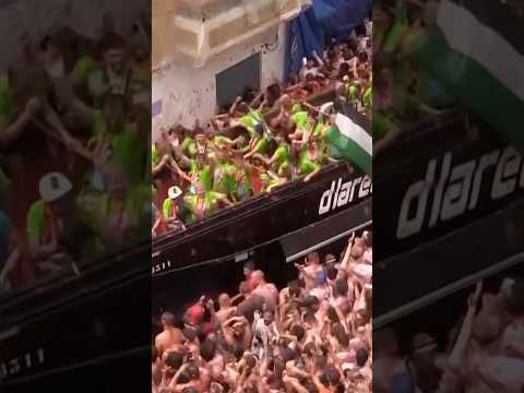 Thousands of revelers threw tomatoes at each other during Spain's annual Tomatina festival