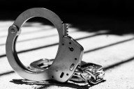 Baltimore duo charged after violent attack on moped rider