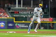 Brewers erase 7-run deficit, extend winning streak to 13 games
