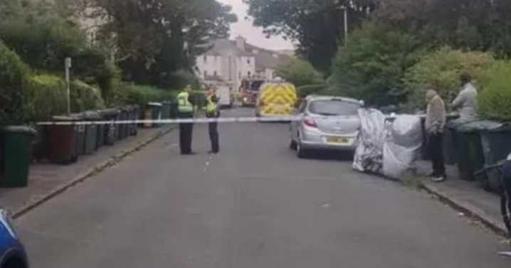 Two men arrested after 'firearm sighting' following flat blaze in Edinburgh