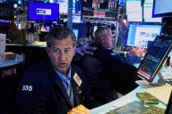 Wall Street climbs again as a worldwide rally comes back around