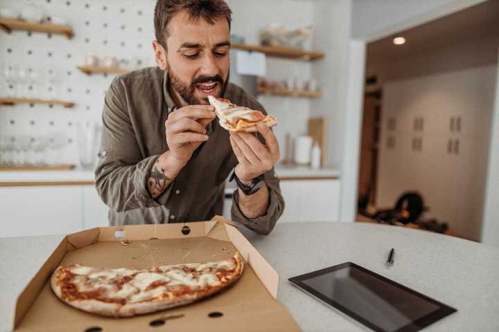 Pizza Expert Shares the No. 1 Best Way to Reheat Leftover Slices