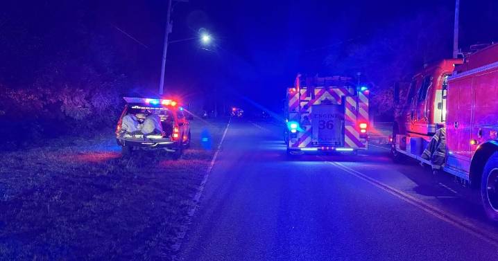Crews work to put out building fire in Derby