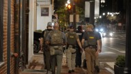 Agentes del FBI y de la DEA con chalecos antibalas patrullan Washington