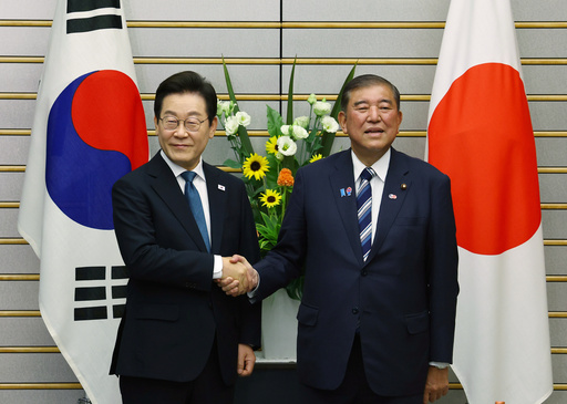 South Korea's president highlight friendly ties in Japan before key summit with Trump