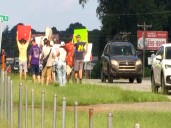 Marchers rally in hopes of turning Greenville Pickens Speedway into a historic site