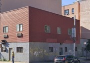Permits filed to expand 2-story Astoria building into a 5-story dwelling for 10 residences