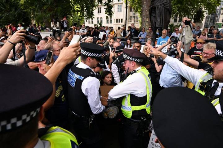 UK police arrest more than 50 at protest for banned Palestine Action group