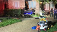 Car crashes into Suffolk home, injuring 2