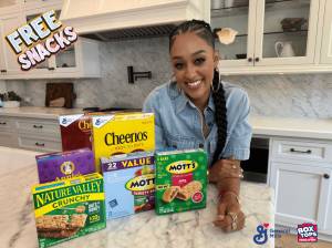 Exclusive: Tia Mowry Says 'It's Not About Being the Perfect Parent' During Back