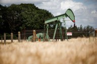 Oil regains ground from 2-month lows ahead of Trump