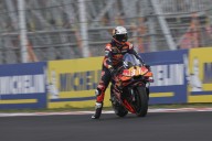 MotoGP Bike Goes Flying in Horrific Crash, Cameraman Narrowly Escapes