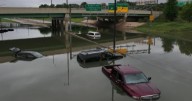 Record rain, flooding slam Midwest